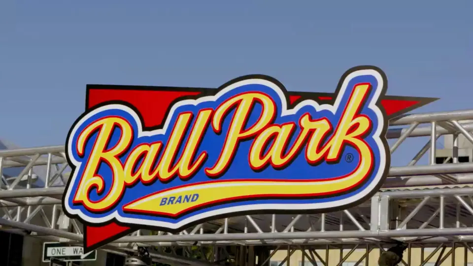 The Ball Park sign on the stage truss.