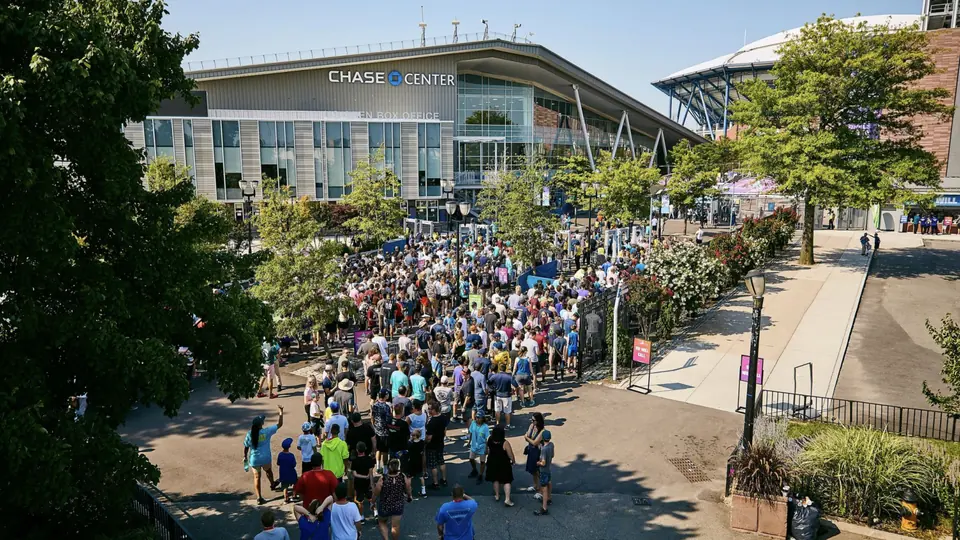 Crowds gathering outside the stadium.