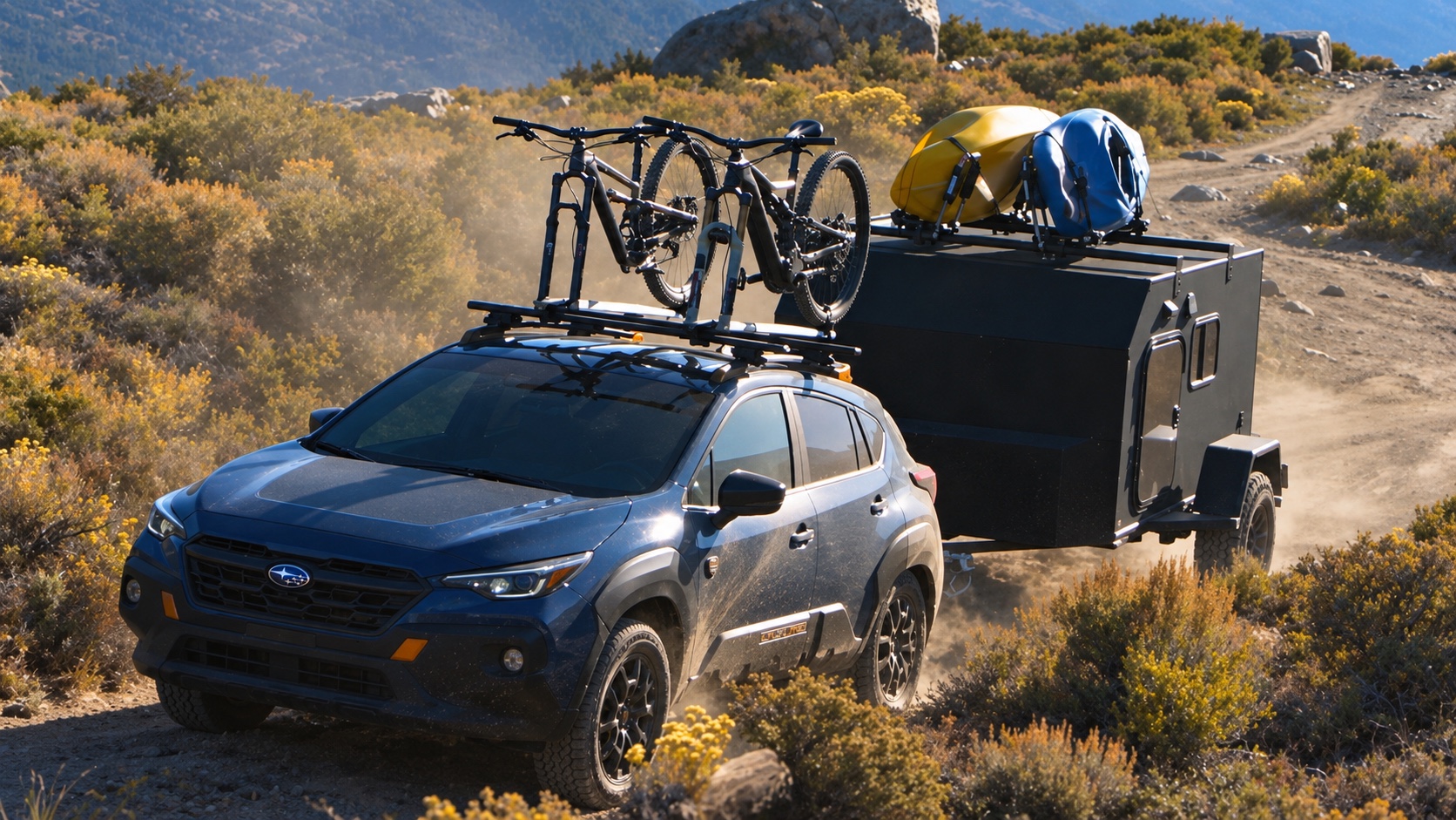 A Subaru towing an adventure trailer with bikes on the roof.